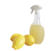 spray avec liquide jaune et 2 citrons